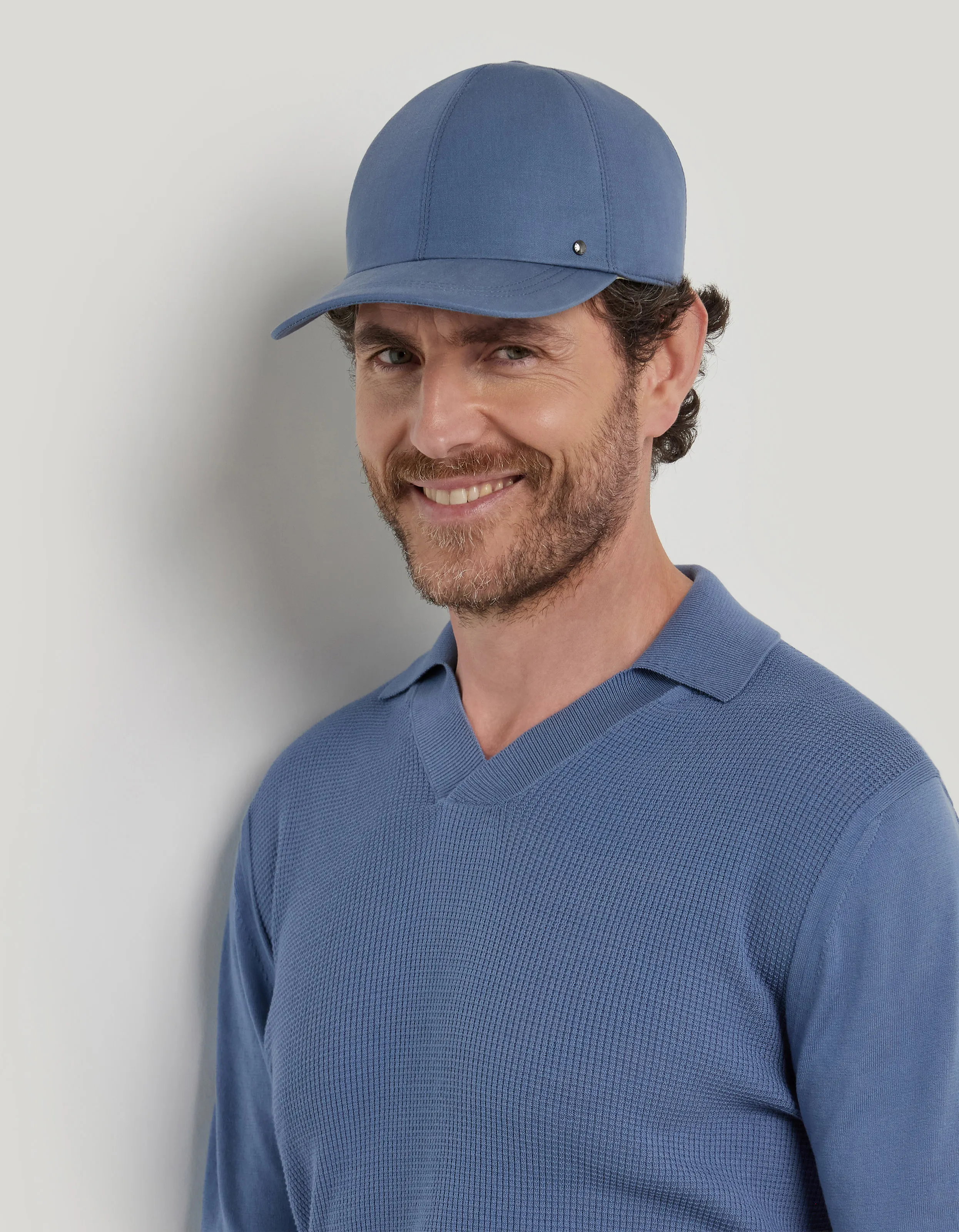 Light blue baseball cap with leather strap