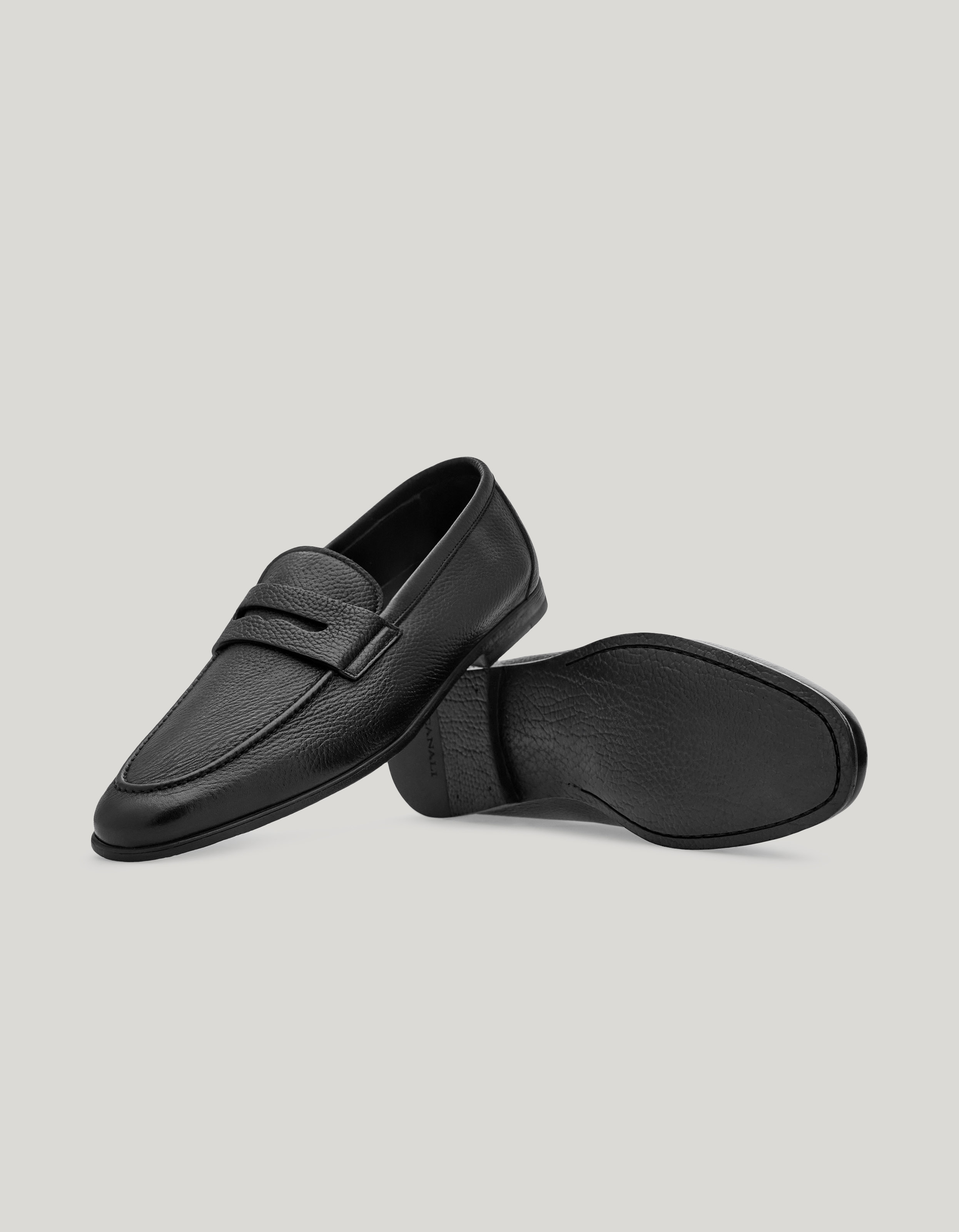Black deerskin penny loafer with leather-effect sole