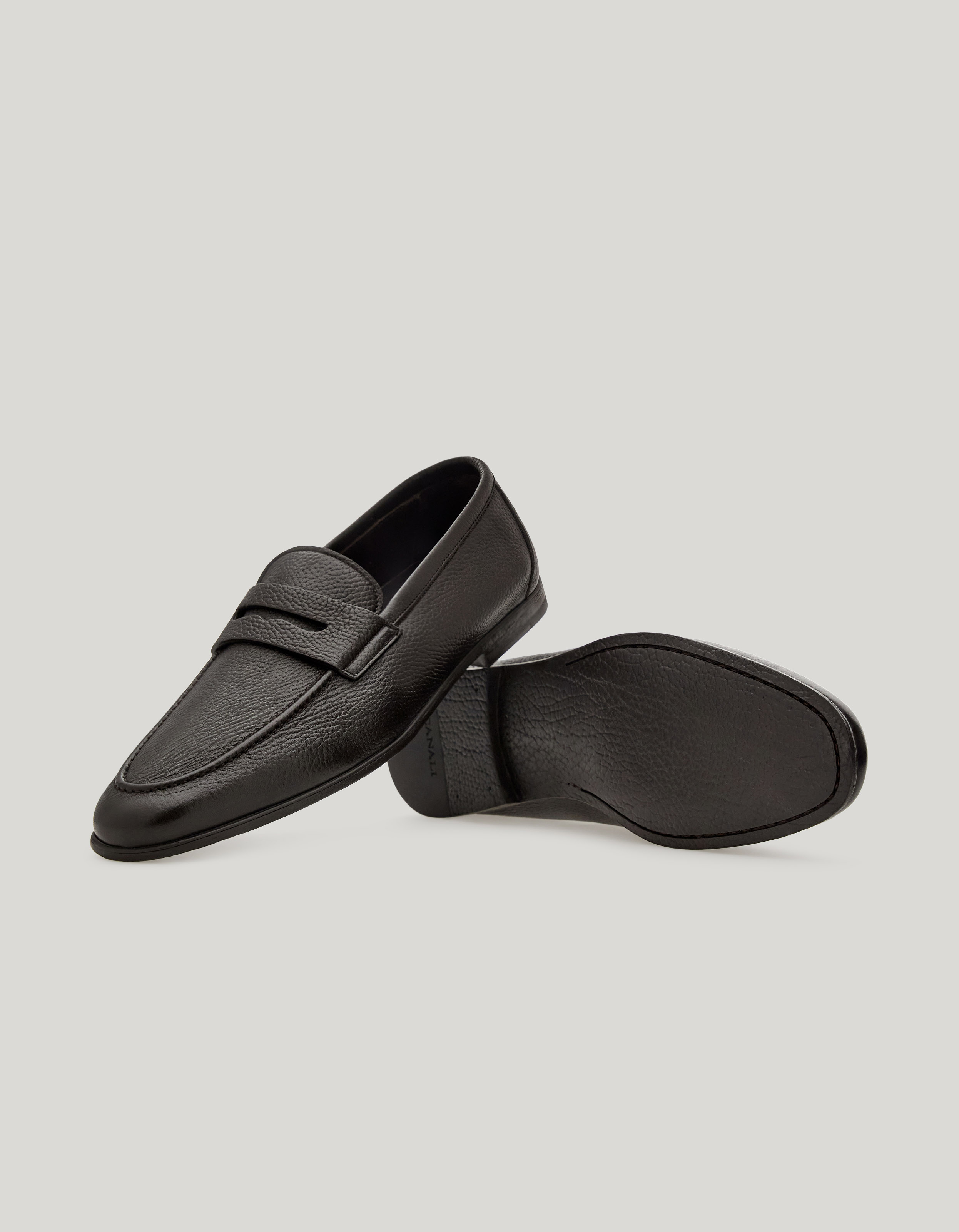 Dark brown deerskin penny loafer with leather-effect rubber sole