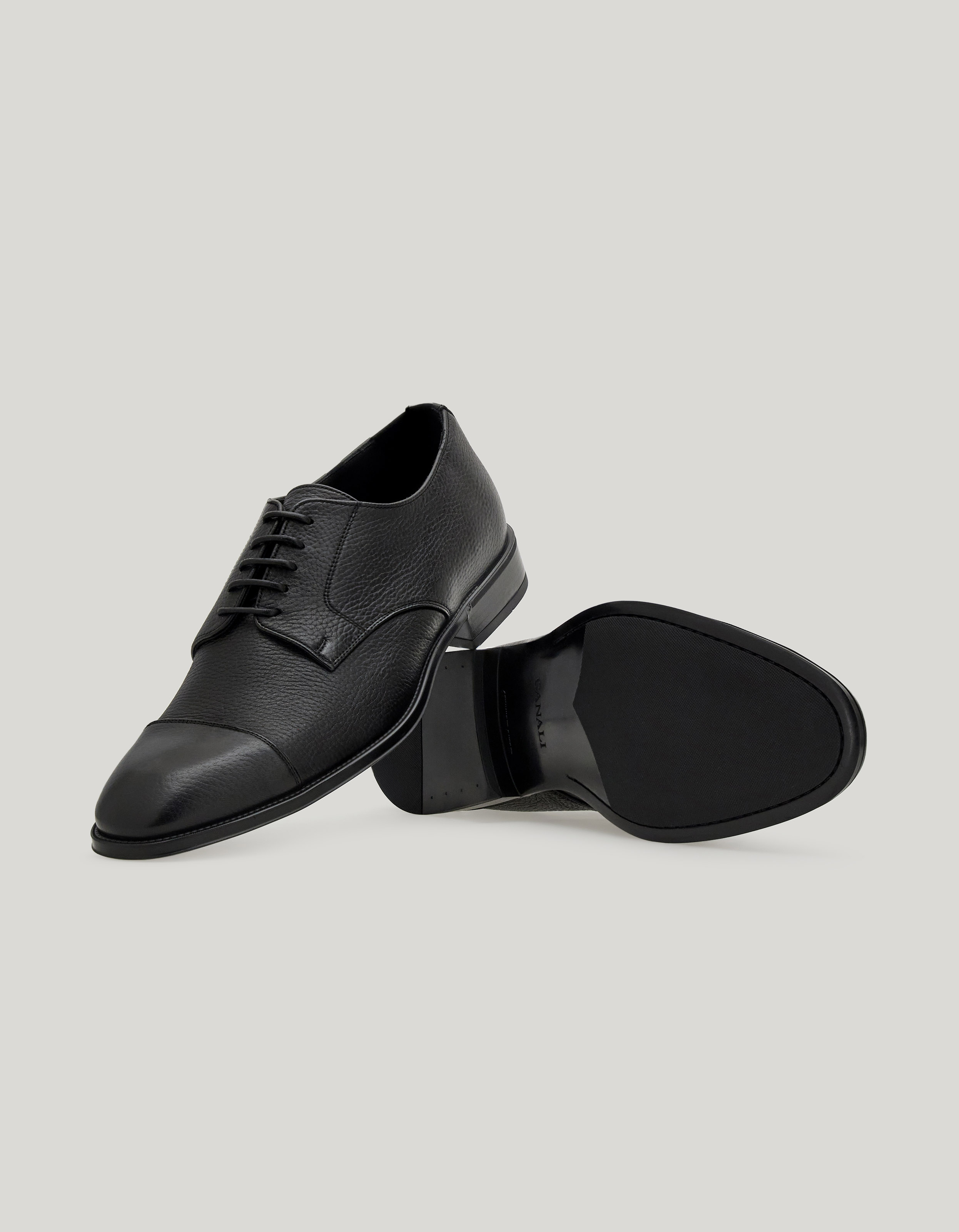 Black deerskin cap-toe derby with rubber sole