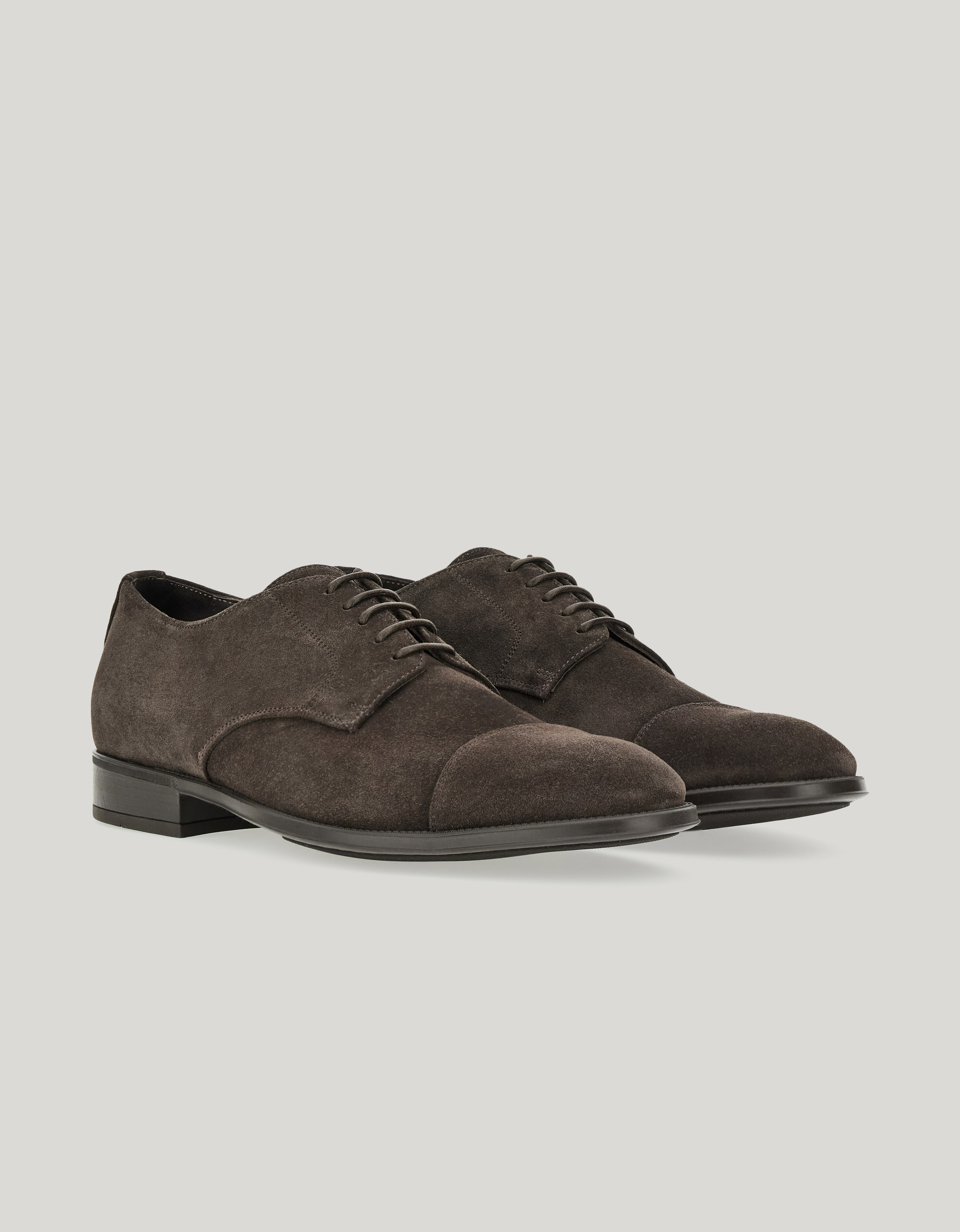 Dark brown suede cap-toe derby with rubber sole 