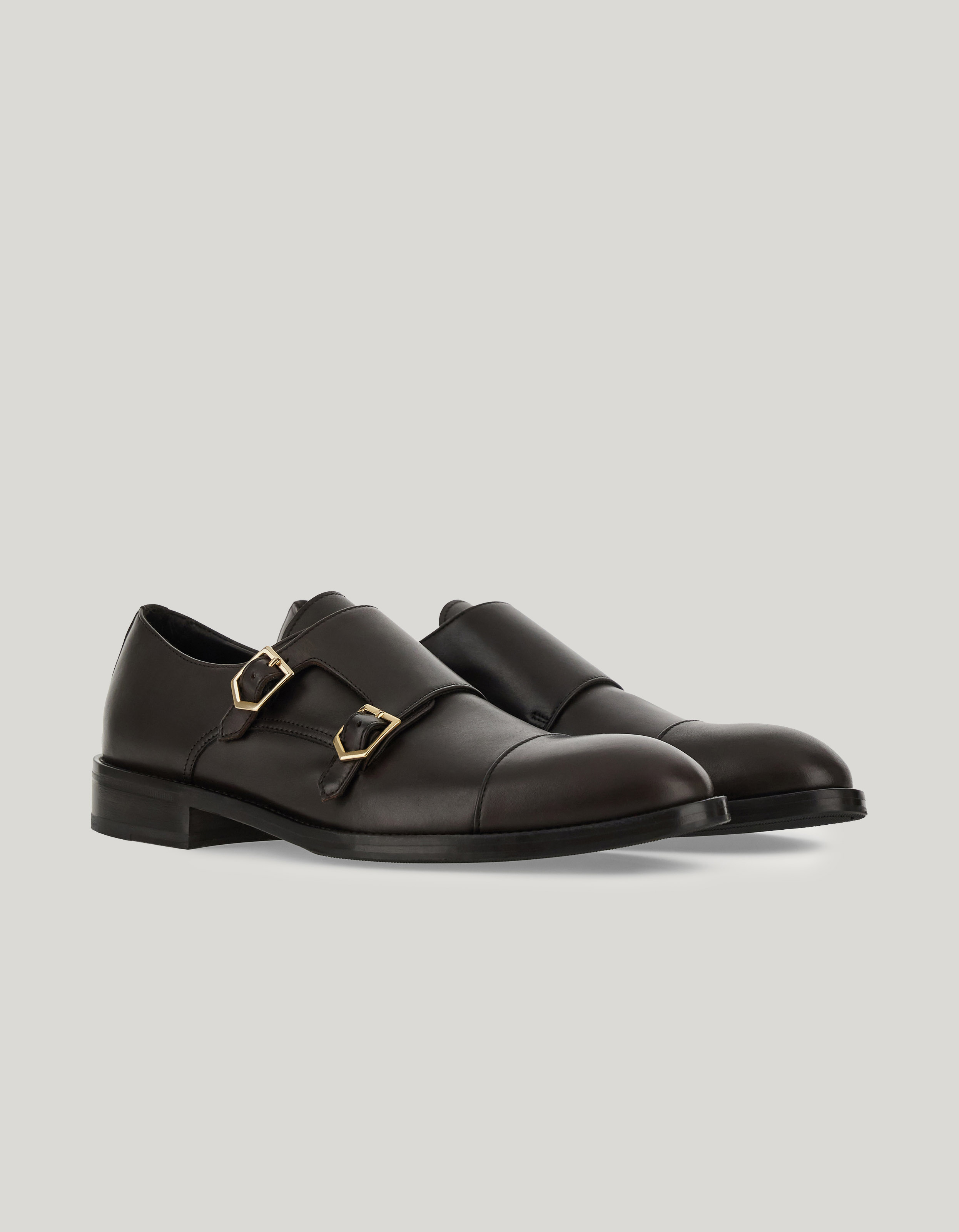 Monk straps in dark brown padded calfskin 
